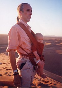 Attachment parenting on the move - low budget backpacking travel with babies and young children - Andrew Green with Fingal on the Saharan dunes in Morocco